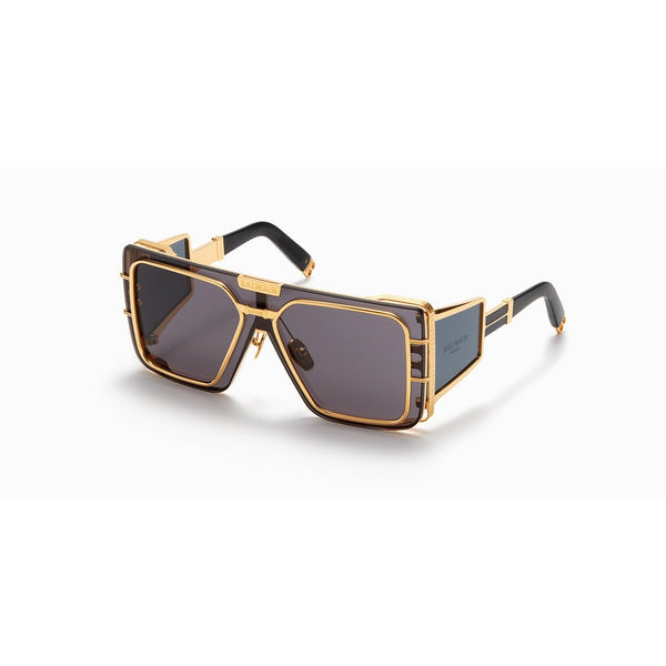 Gray with gold toned titanium  Oversized square shape Gray tinted lenses 100% UV protection Made in Japan Case and lens cloth included