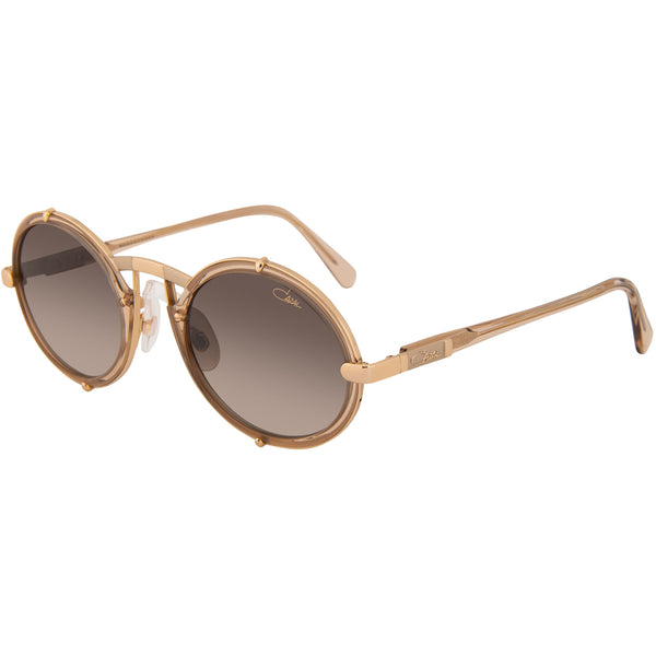 Champagne acetate and gold accents Round shape Gradient tinted lenses Lens size: 53 mm | Bridge: 12 mm  100 % UV protection Made in Germany Case and lens cloth included