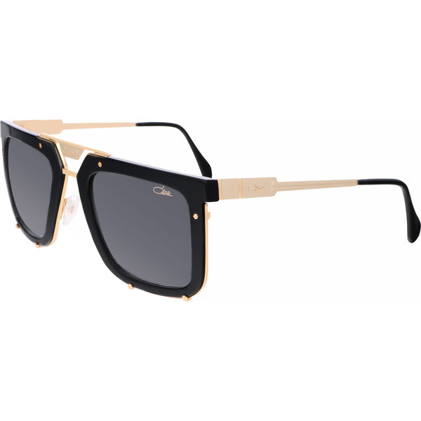 Black acetate and gold accents Square shape Solid tinted lenses Lens size: 56 mm | Bridge: 25 mm  | Temples: 145 mm 100 % UV protection Made in Germany Case and lens cloth included