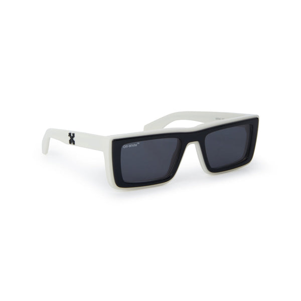 White and black acetate frame Modern rectangular shape Contrast logo on temples Solid tinted lenses Lens size: 55 mm | Bridge: 21 mm | Temples: 145 mm 100% UV protection Made in Italy Case and lens cloth included