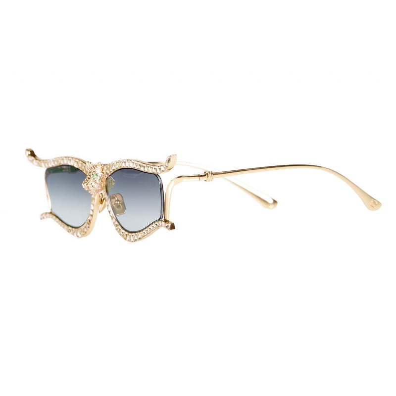 Gold toned frame with hand set crystals Cat eye shape Genuine emeralds on panther eyes Gradient tinted Carl Zeiss lenses Lens size: 56 mm | Bridge: 16 mm | Temples: 135 mm 100 % UV protection Handmade in Japan and Italy Case and lens cloth included