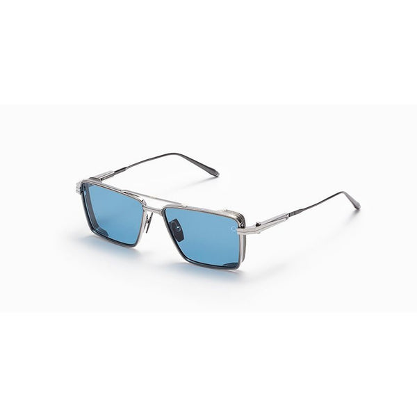Brushed palladium titanium hardware Navigator shape with side shields  Solid blue lenses Lens size: 55 mm | Bridge: 16 mm | Temples: 152 mm 100 % UV protection Made in Japan Case and lens cloth included