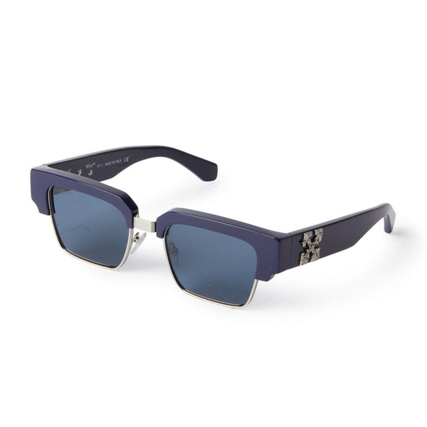 Navy acetate front and silver tone trim Square shape Silver Logo on temples Solid tinted lenses 100% UV protection Made in Italy Case and lens cloth included