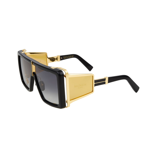 Black with gold toned titanium  Oversized square shape Balmain Logo on side shields Gray tinted lenses Lens size: 61 mm | Bridge: 14 mm | Temples: 145 mm 100% UV protection Made in Japan Case and lens cloth included